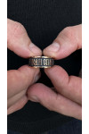 Gold heel with the prayer "Our Father"