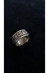 Gold heel with the prayer "Our Father"