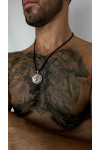 Silver amulet pendant with the image of a lion