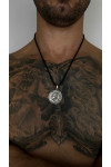 Silver amulet pendant with the image of a lion