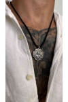Silver amulet pendant with the image of a Cossack