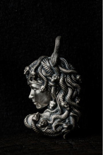 Silver pendant with the image of Medusa Gorgon