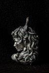 Silver pendant with the image of Medusa Gorgon