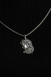 Silver pendant with the image of Medusa Gorgon